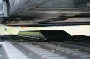 Een beschermbalk moet beschadigingen aan het chassis voorkomen.